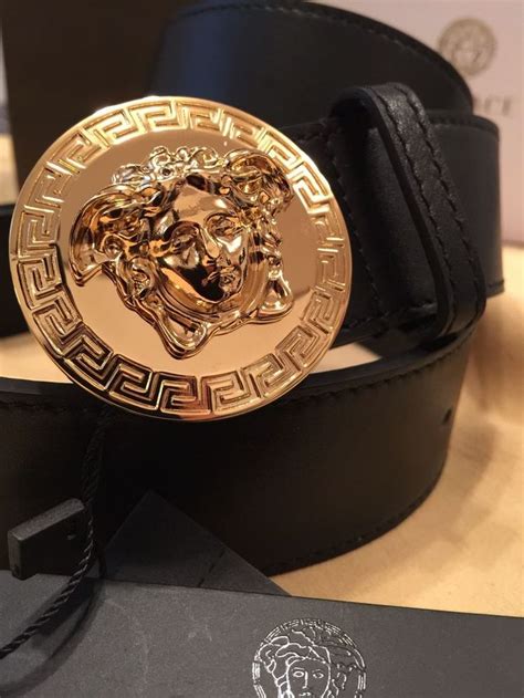 black versace belt gold buckle.